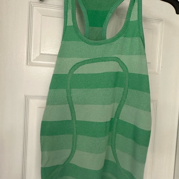 Lululemon - two tops- price is for the two. Teal V-Neck Top and Green tank top - Picture 5 of 8